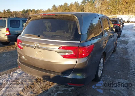2018 Honda Odyssey Lx z USA, uszkodzony, nr VIN 5FNRL6H28JB075958